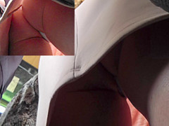 Her office-style skirt lets us enjoy real upskirt view