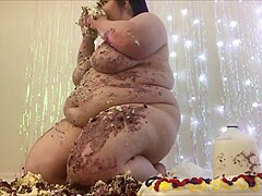 Messy eating cake while getting free porn image